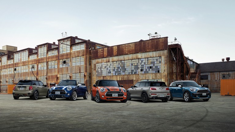 The latest MINI model line-up in an urban environment.