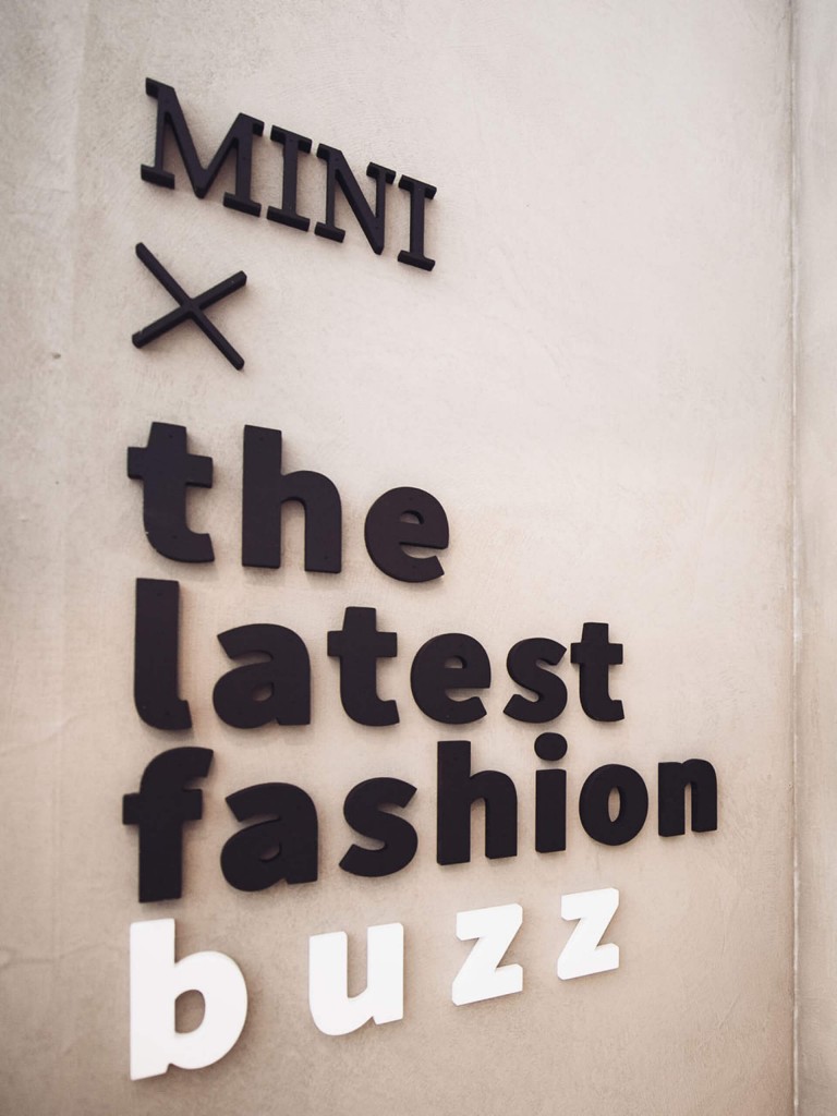 MINI – the latest fashion buzz' adorns the wall of the MINI pavilion at Pitti Uomo 91. 