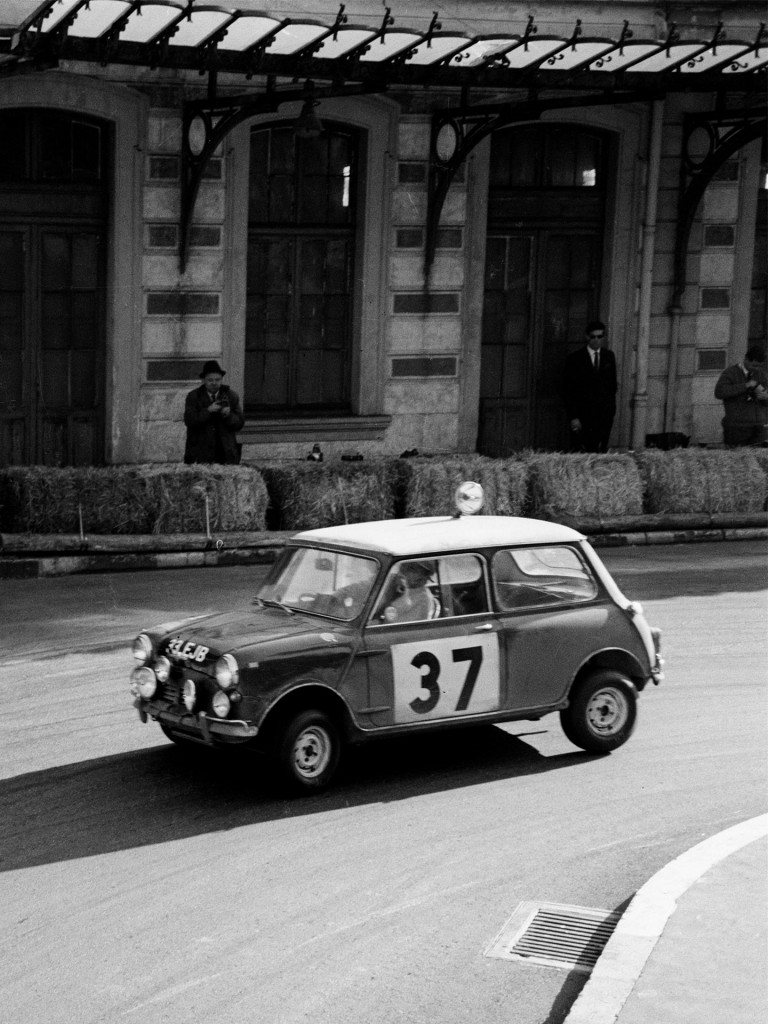 Paddy Hopkirk driving the #37 red Mini to 1964 Monte Carlo Rally victory.