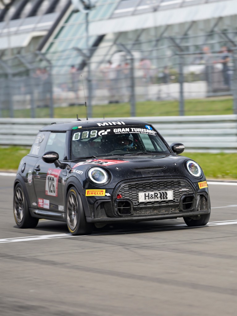 A modern John Cooper Works MINI taking place in a rally.