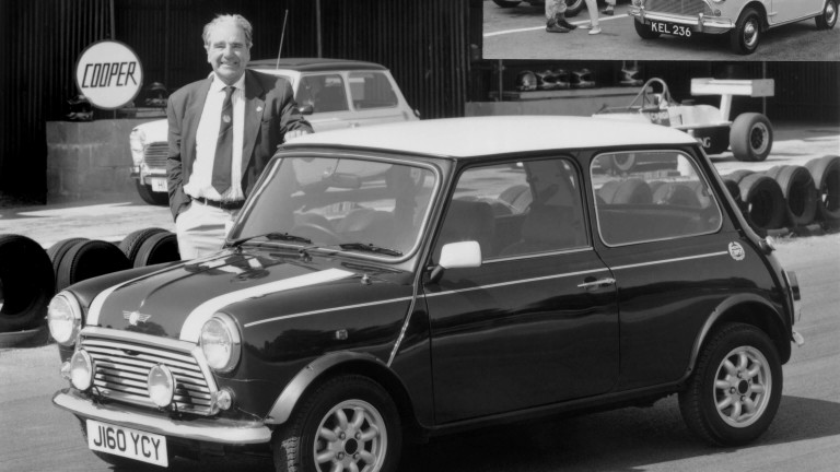John Cooper stands beside the Mini Cooper 1.3i in 1961.