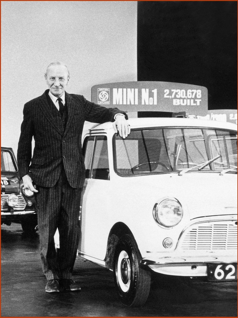The original Mini’s lead designer, Sir Alec Issigonis pictured next to a Mini.