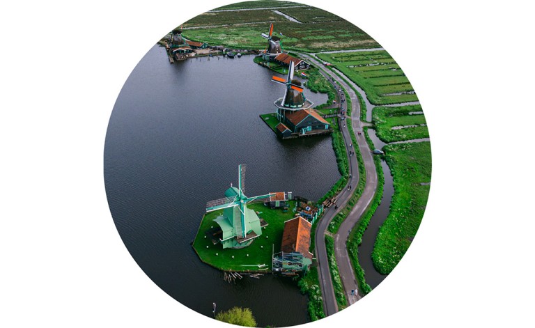 Overhead shot of the Shermer windmills, dotted along the water’s edge.