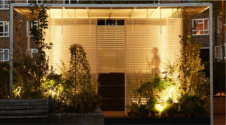 The MINI LIVING 'Forests' Installation illuminated at night.