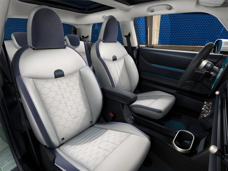 A look inside the vehicle: driver and passenger seats of the New MINI Cooper.
