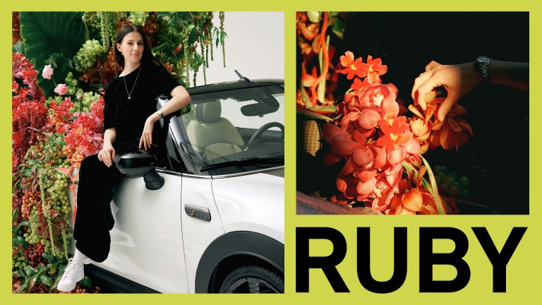 Left: Ruby Barber and the MINI Convertible as a floral work of art; right: detail shot of Ruby’s hand adjusting some orchids. 