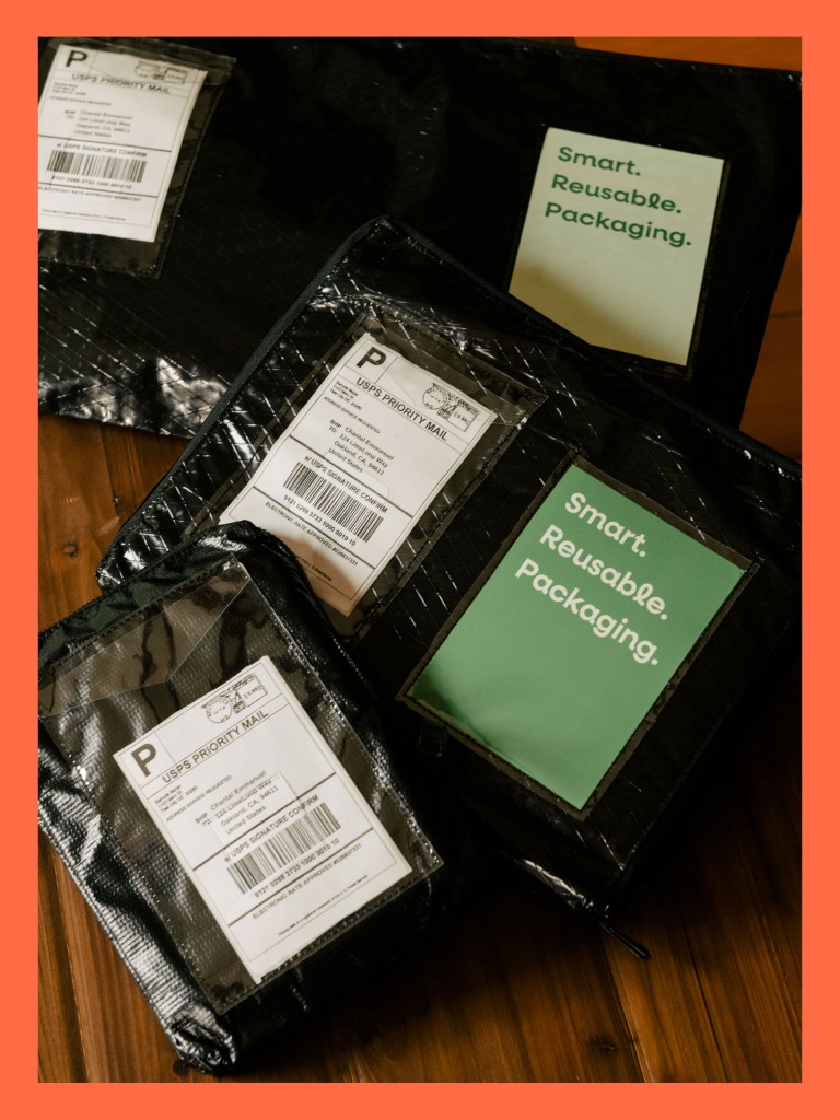 Image of several reusable packages for sustainable shipping by the startup LimeLoop.